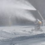 Snowmaking machines prep the mountain for a social distanced ski season. (Mike Anderson/KSL-TV)