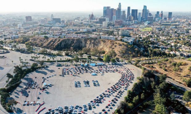 In an aerial view from a drone, cars are lined up at Dodger Stadium for COVID-19 testing on the Mon...