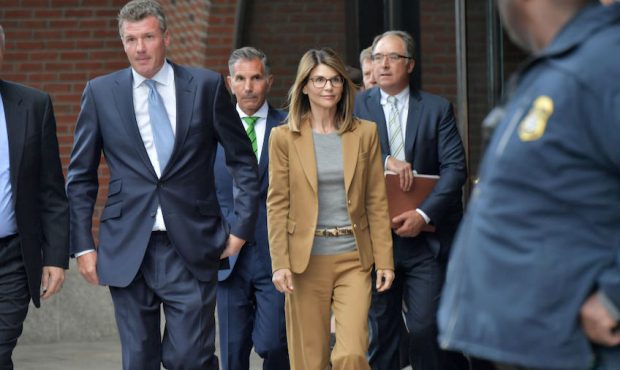 FILE: Lori Loughlin exits the John Joseph Moakley U.S. Courthouse after appearing in Federal Court ...