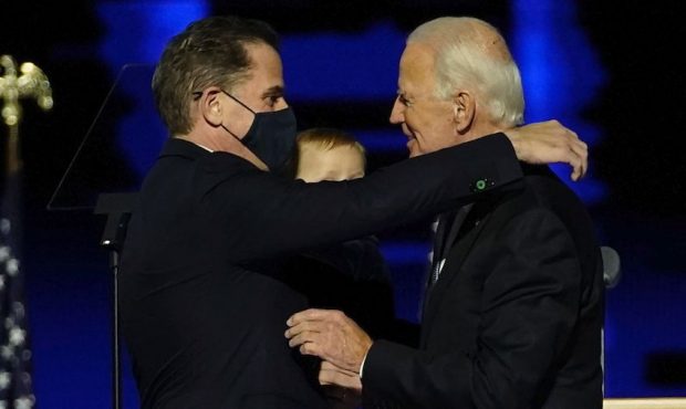 WILMINGTON, DELAWARE - NOVEMBER 07:  President-elect Joe Biden embraces his son Hunter Biden after ...
