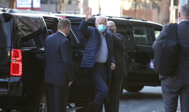 U.S. President-elect Joe Biden waves as he arrives for a virtual roundtable with workers and small ...