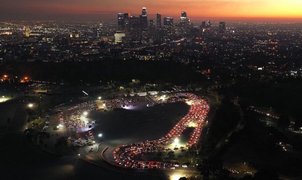 LOS ANGELES, CALIFORNIA - DECEMBER 2: In an aerial view from a drone, cars are lined up at Dodger S...