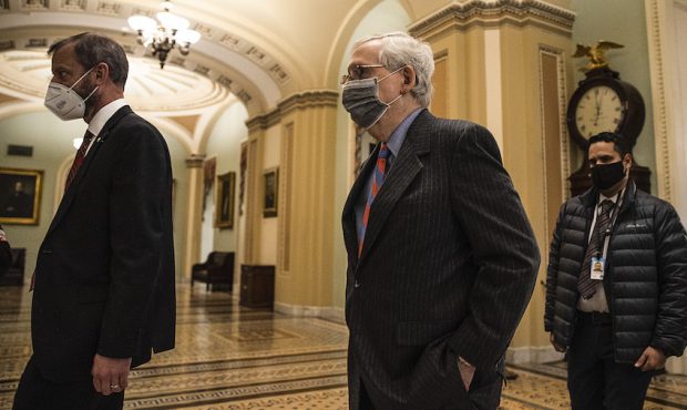 WASHINGTON, DC - DECEMBER 17: U.S. Senate Majority Leader Mitch McConnell (R-KY) walks to the Senat...