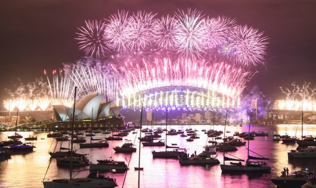 SYDNEY, AUSTRALIA - JANUARY 01: A fireworks display over the Sydney Harbour Bridge during New Year'...