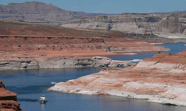 FILE: Boats navigate the waters of Lake Powell on March 28, 2015 in Page, Arizona. As severe drough...
