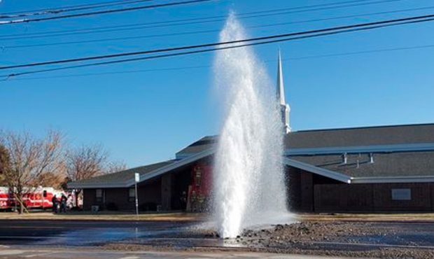 Water gushes into the air after a main break near 2700 W 7200 S in West Jordan on Saturday, Dec. 5,...