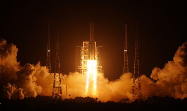 A Long March-5 rocket carrying Chang'e-5 spacecraft blasts off on November 24, 2020, in Wenchang, H...