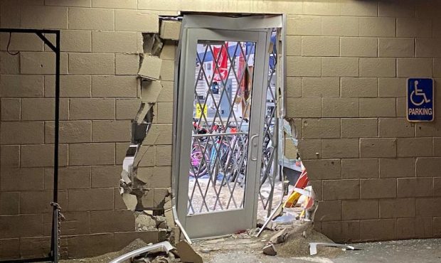 A car rammed the entrance to a pawn shop in Murray on Dec. 22, 2020 (Photo: Derek Petersen, KSL TV)...
