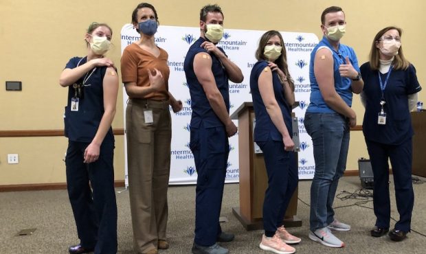 LDS Hospital workers show off their injection sites after receiving the COVID-19 vaccine. (KSL-TV)...