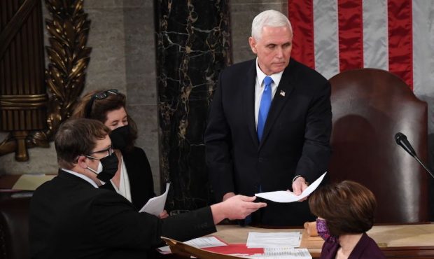 U.S. Vice President Mike Pence presides over a joint session of Congress on January 06, 2021 in Was...