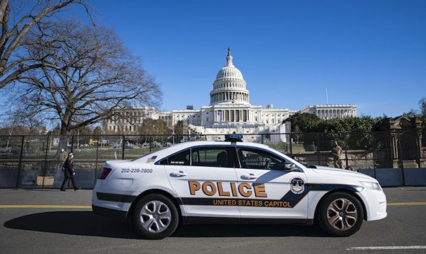 WASHINGTON, DC - JANUARY 09: A U.S. Capitol Police car drives past on patrol in front of security f...