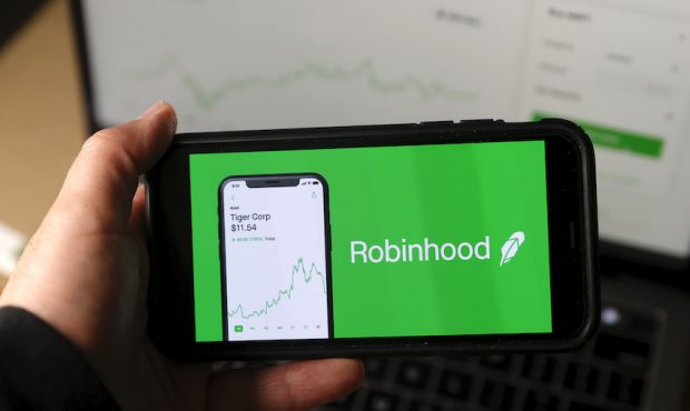 In this photo illustration, the Robinhood logo is displayed on an iPhone on December 17, 2020 in Sa...