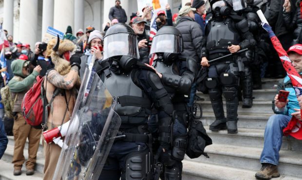 Police make their way through protesters at the U.S. Capitol Building on January 06, 2021 in Washin...