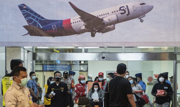 JAKARTA, INDONESIA - JANUARY 09: Relatives of passengers on Sriwijaya Air flight SJ 182 leave the c...