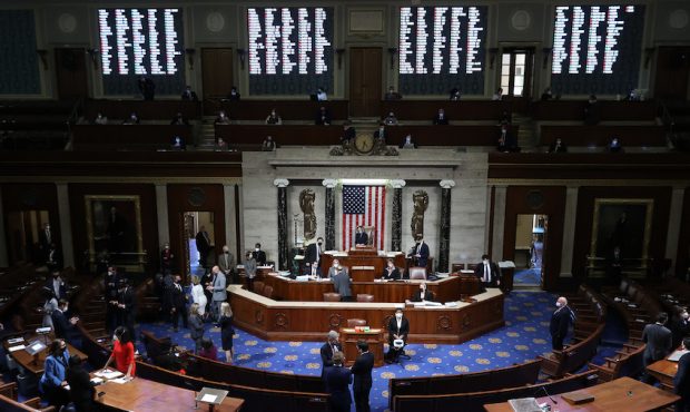 WASHINGTON, DC - JANUARY 13:  Speaker of the House Nancy Pelosi (D-CA) presides over the vote to im...