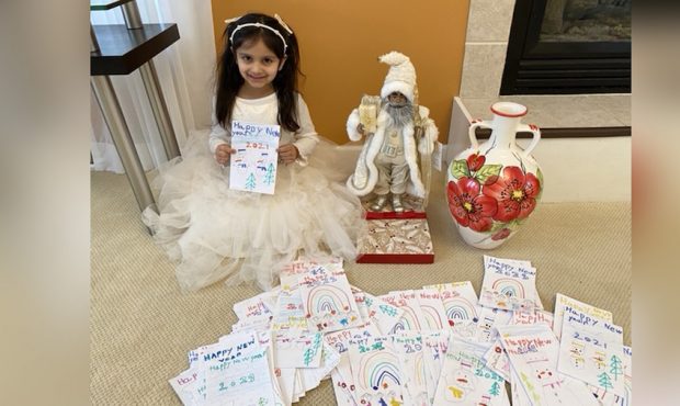 Aryana with the 200 cards and gifts she bought for residents of the Willow Point nursing home. (Cou...