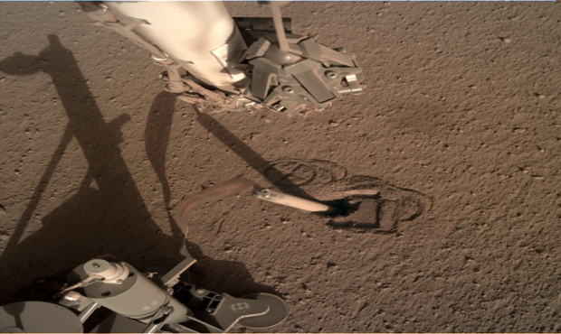 NASA's InSight Mars lander acquired this image using its robotic arm-mounted, Instrument Deployment...