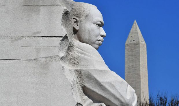The Washington Memorial is seen behind the "Stone of Hope" statue at the Martin Luther King Jr. Mem...