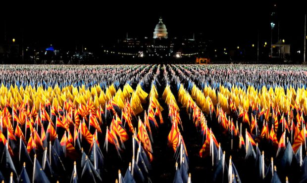 TOPSHOT - The "Field of Flags" is pictured on the National Mall as the US Capitol Building is prepa...