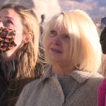 Karen Kirkman and her family watch as the Capitol bells rang to honor her husband, Ken Kirkman, and all Utahns who died because of COVID-19. (KSL-TV)