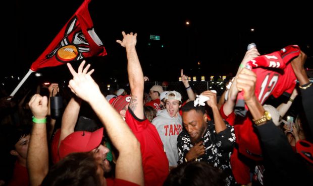 Tampa Bay Buccaneers fans celebrate after Super Bowl LV on February 7, 2021 in Tampa, Florida. Tamp...