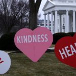 Heart-shape signs with Valentine messages are on display on the North Lawn of the White House February 12, 2021 in Washington, DC. The office of first lady Jill Biden set up the Valentine messages to the country overnight to mark Valentine’s Day. According to a media release, Valentine’s Day has always been one of the favorite holidays of the first lady.  (Photo by Alex Wong/Getty Images)