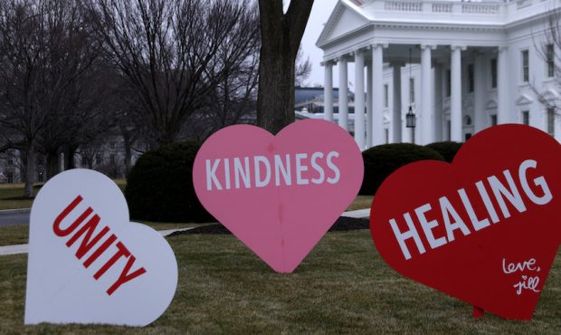 Heart-shape signs with Valentine messages are on display on the North Lawn of the White House Febru...