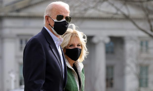 U.S. President Joe Biden and first lady Jill Biden walk towards the Marine One on the South Lawn pr...