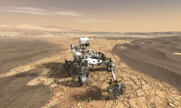 An illustration of NASA’s Perseverance rover exploring inside Mars. (Image courtesy NASA)...