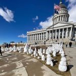 About 600 snowmen appeared on Capitol grounds, holding signs and demanding that Utah state lawmakers save their "endangered species" — the snow. (@pricecarbonplz, Twitter)