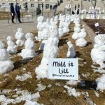 About 600 snowmen appeared on Capitol grounds, holding signs and demanding that Utah state lawmakers save their "endangered species" — the snow. (@pricecarbonplz, Twitter)