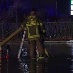 Crews had to pump water out of the building and parking lot. (KSL TV)