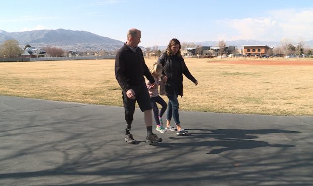 Chris Longacre with his wife and daughter. (Stuart Johnson/KSL TV)...