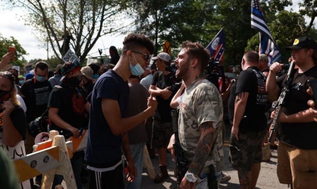 FILE: Protesters and counter protesters face off at a protest on August 15, 2020 near the downtown ...