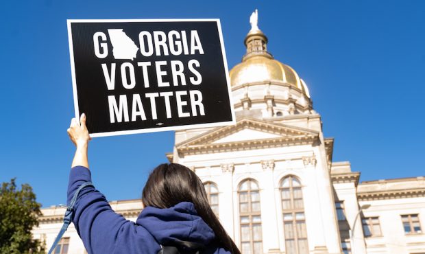 Demonstrators stand outside of the Georgia Capitol to oppose the HB 531 bill  HB 531 will add contr...