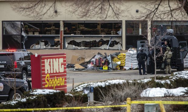 Tactical police units respond to the scene of a King Soopers grocery store after a shooting on Marc...