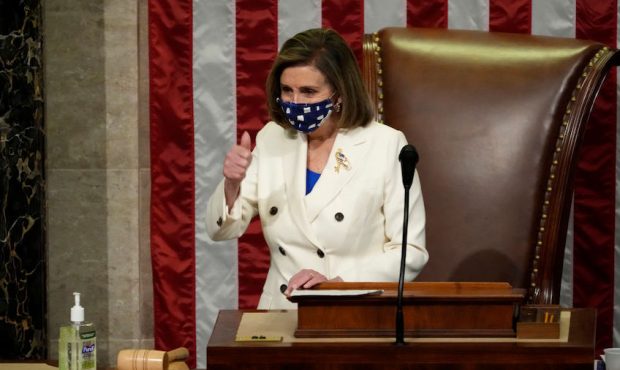 Speaker of the House Nancy Pelosi (D-CA) gives a thumbs up as she presides over voting on coronavir...