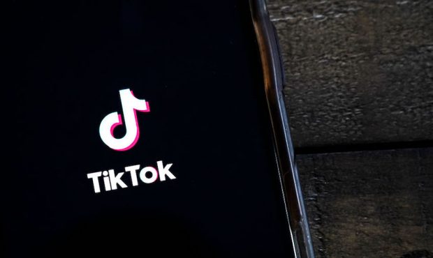 FILE: In this photo illustration, the TikTok app is displayed on an Apple iPhone on August 7, 2020 ...