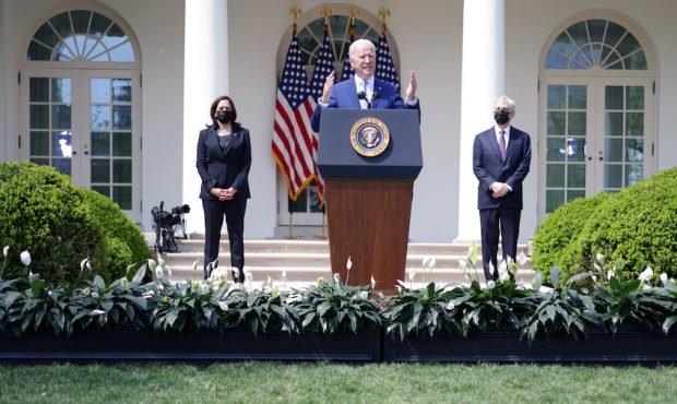 President Joe Biden speaks as Vice President Kamala Harris and Attorney General Merrick Garland lis...