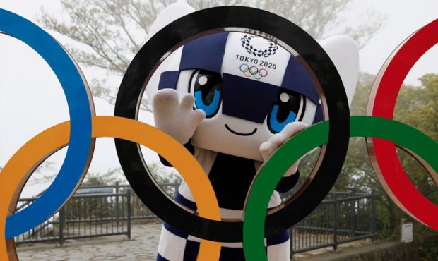 Tokyo 2020 Olympic Games mascot Miraitowa poses with the Olympic Symbol after unveiling ceremony on...