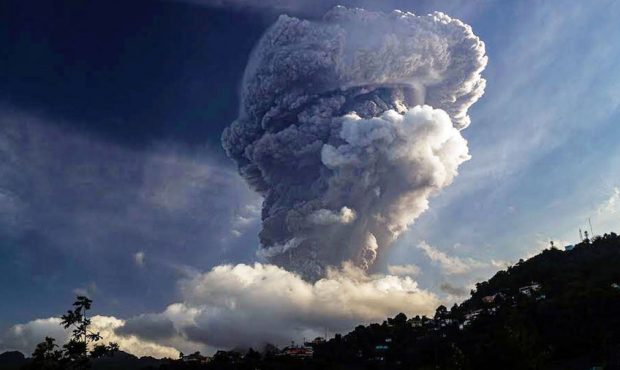 Plumes of ash billow from the La Soufrière volcano on the island of St. Vincent and the Grenadines...