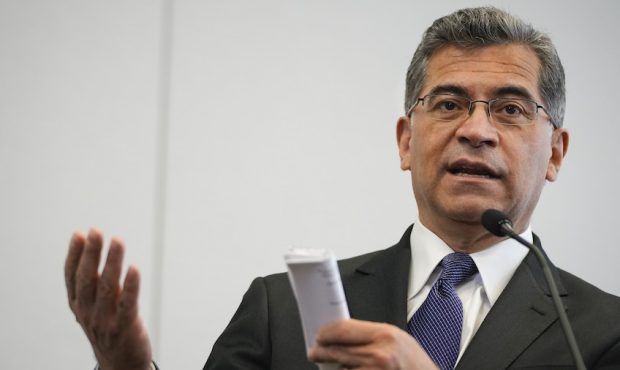 Secretary of Health and Human Services Xavier Becerra speaks to the press after taking a tour of a ...