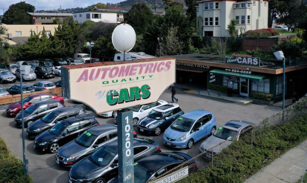 FILE: Used cars sit on the sales lot at Autometrics Quality Used Cars on March 15, 2021 in El Cerri...