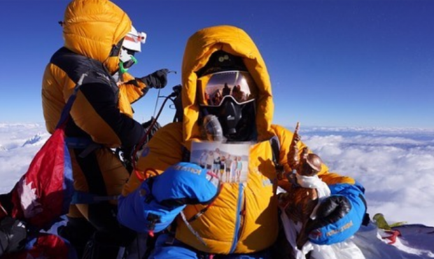 Jenn Drummond on the summit of Mount Everest. (Used by permission, Jenn Drummond)...