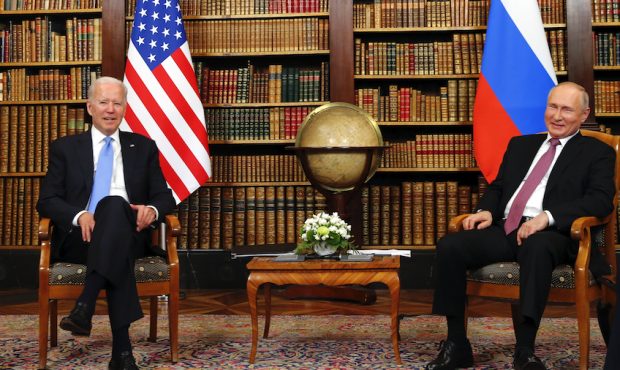 US president Joe Biden (L) and Russia's President Vladimir Putin meet at the start of the U.S.-Russ...