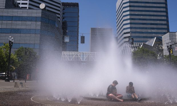 Kids play in the Salmon Springs Fountain on June 27, 2021 in Portland, Oregon. Record breaking temp...