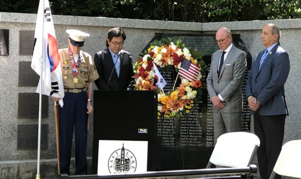 Marine Veteran John Cole (left) and  Sang Soo Yoon, Consul General of South Korea (second from left...