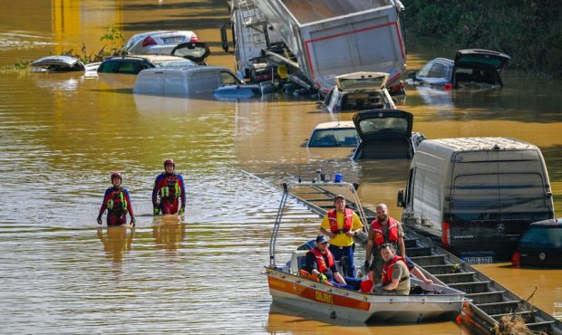 Search and rescue teams are seen on a flooded and damaged part of the highway (A1) on July 17, 2021...
