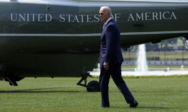 President Joe Biden walks on the South Lawn towards Marine One while departing the White House July...