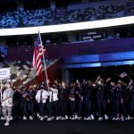 Flag bearers Sue Bird and Eddy Alvarez of Team United States lead their team out during the Opening Ceremony of the Tokyo 2020 Olympic Games at Olympic Stadium on July 23, 2021 in Tokyo, Japan. (Photo by Jamie Squire/Getty Images)